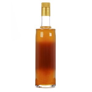 Licor de orujo con miel de romero en botella de cristal reverso