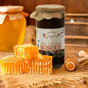 Miel de bosque con fondo rustico