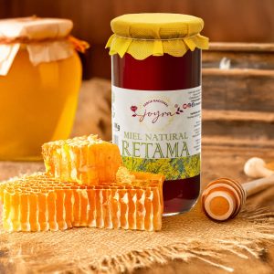 Miel de retama con fondo rústico