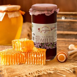 Miel de tomillo con fondo rústico