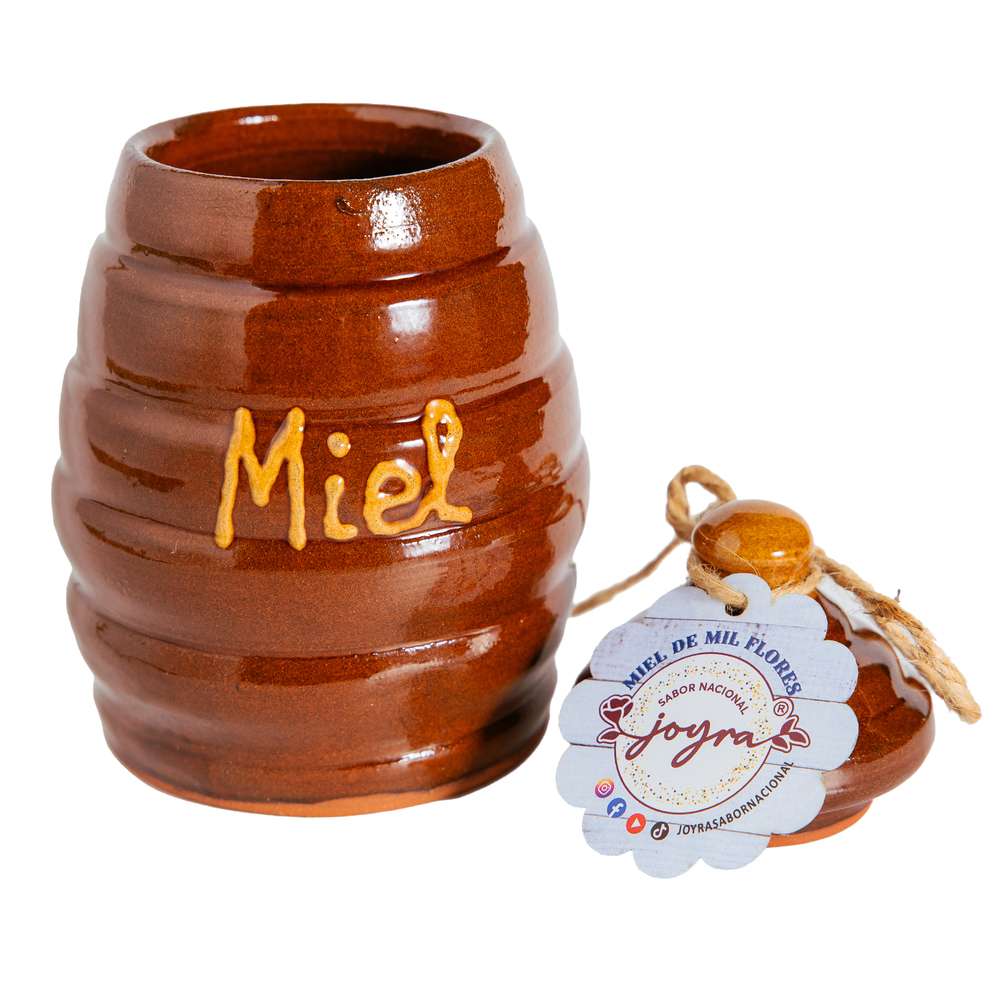 Mostrando la Jarra de barro decorativa para miel en forma de panal abierta
